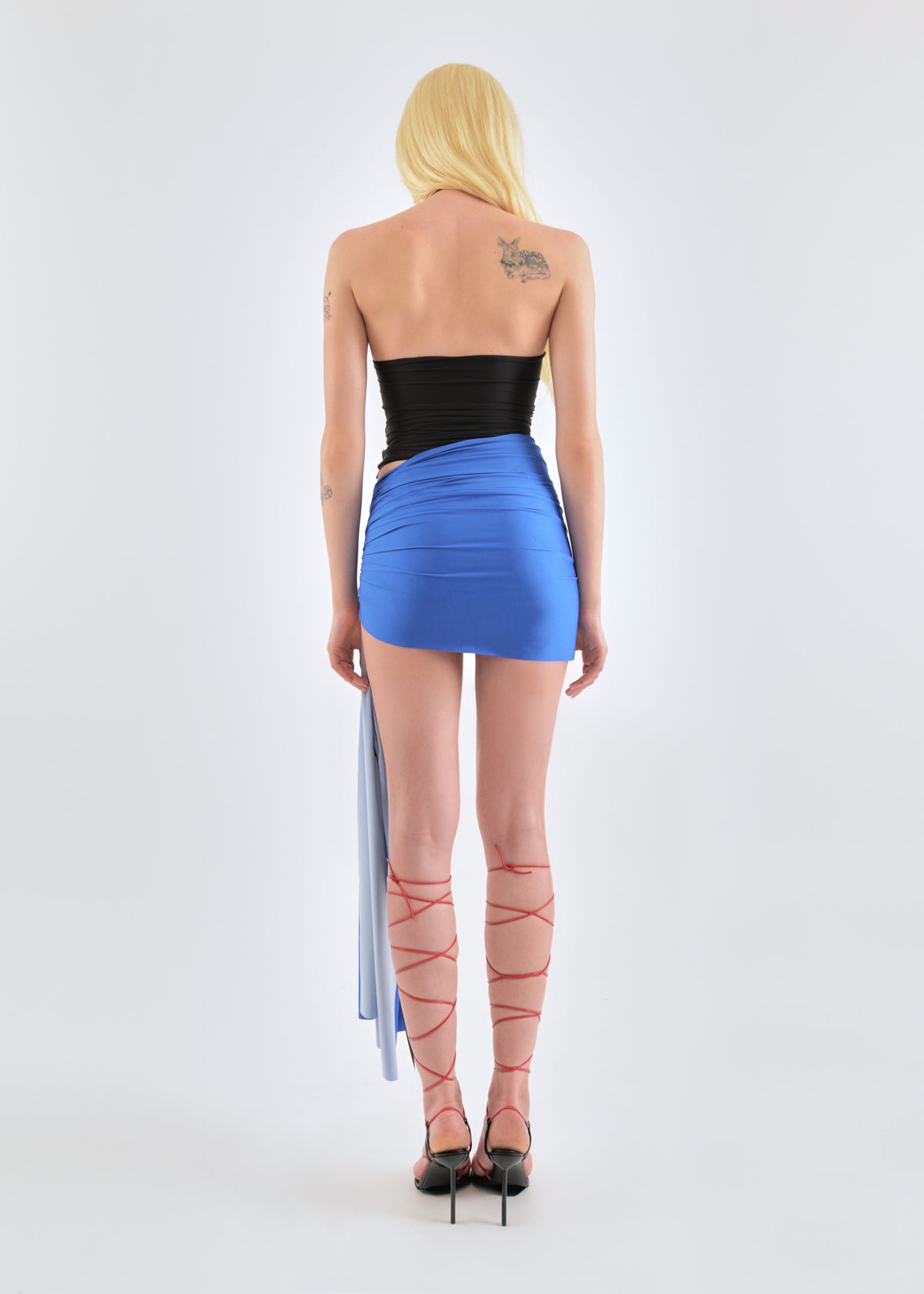 Signature mini jersey skirt in cobalt/wine