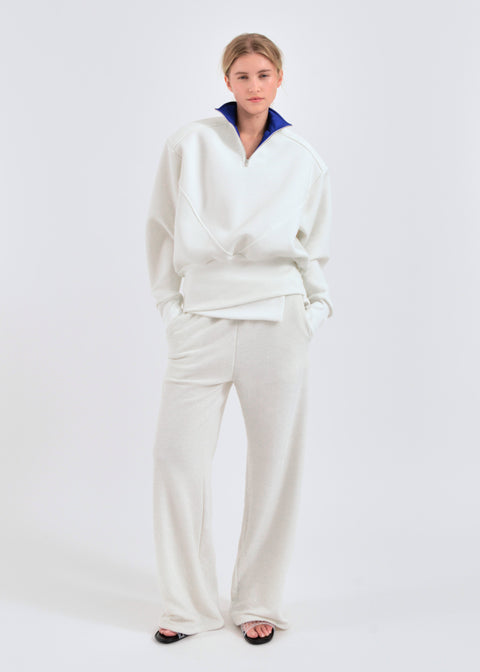 Wide shoulder zip-up jumper in beige