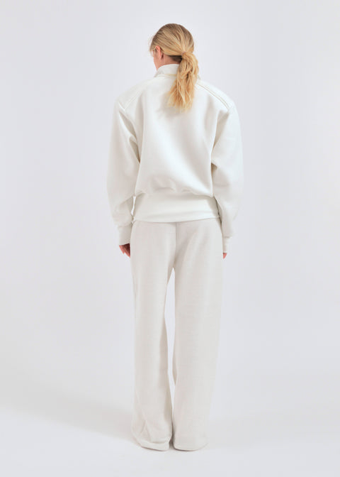 Wide shoulder zip-up jumper in beige